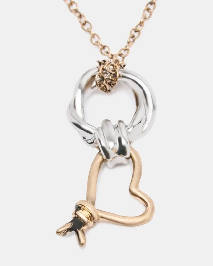 Colar com pendente em forma de coração com nó em dois tons Colar com pendente em forma de coração com nó em dois tons