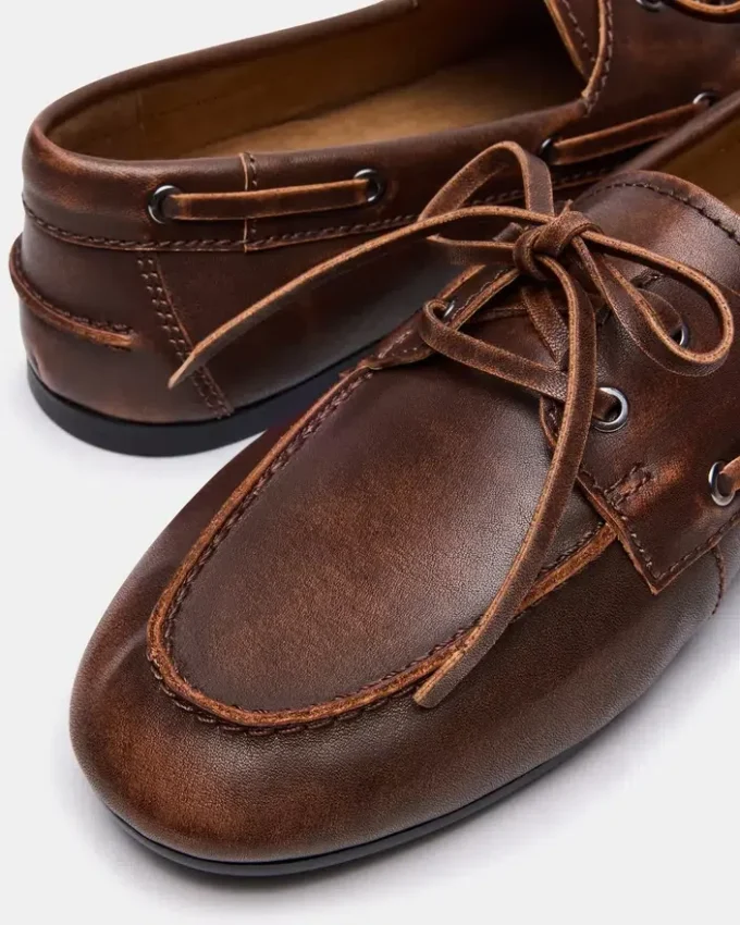 Scoutt em couro castanho